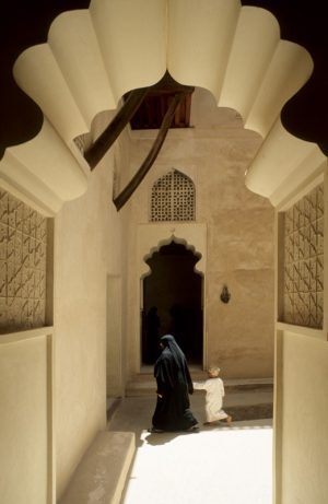 Woman and Child in a Courtyard